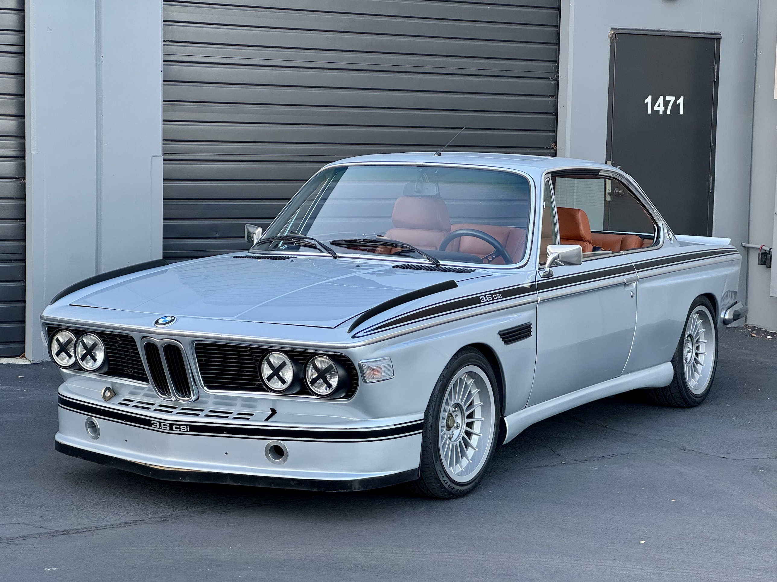 1971 BMW 3.0CS parked outside the shop