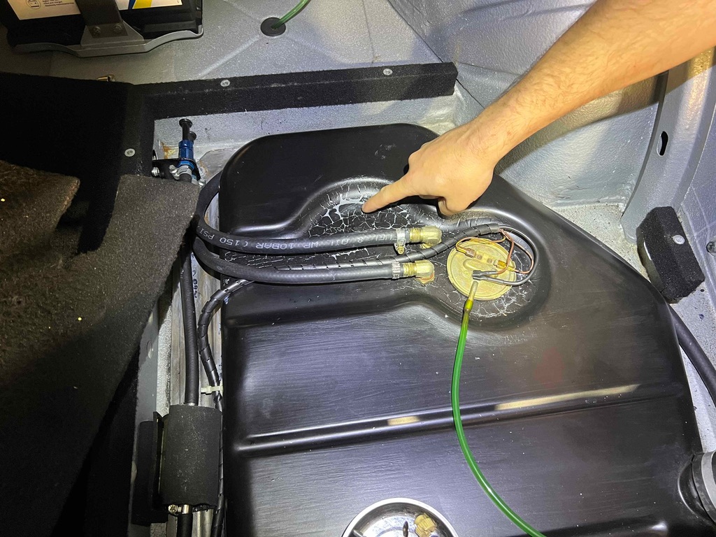Fuel tank and wiring in the trunk