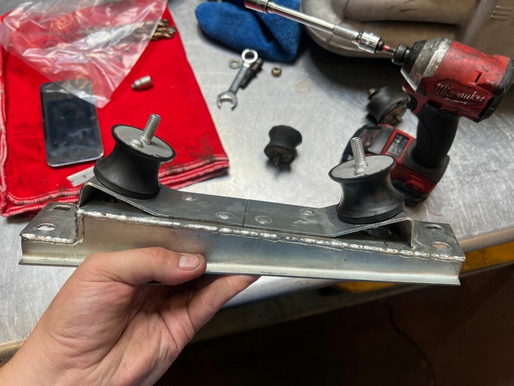 Transmission mount bracket with new rubber mounts